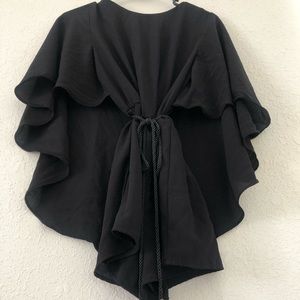 Black romper with rope tie and cape